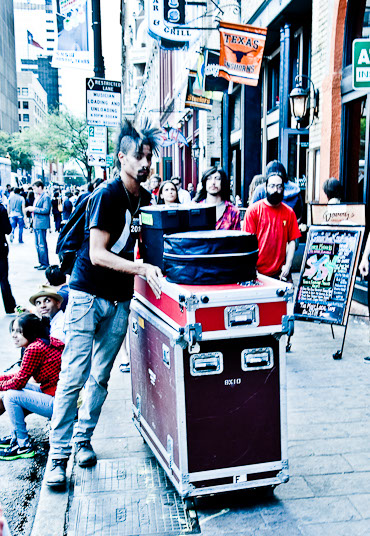 Musician hauling gear during SXSW